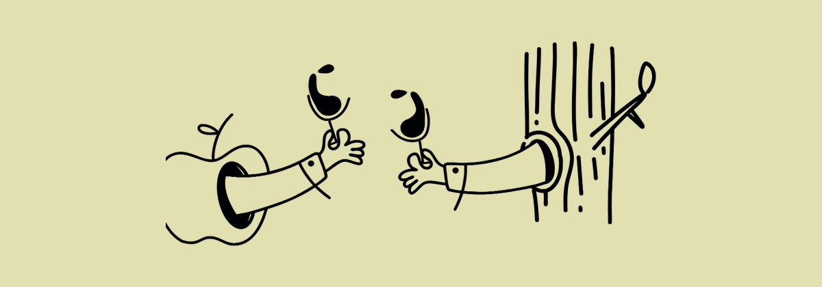 Two hands raising wine glasses